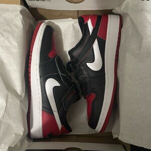 Jordan Black and Red Sneakers with White Swoosh